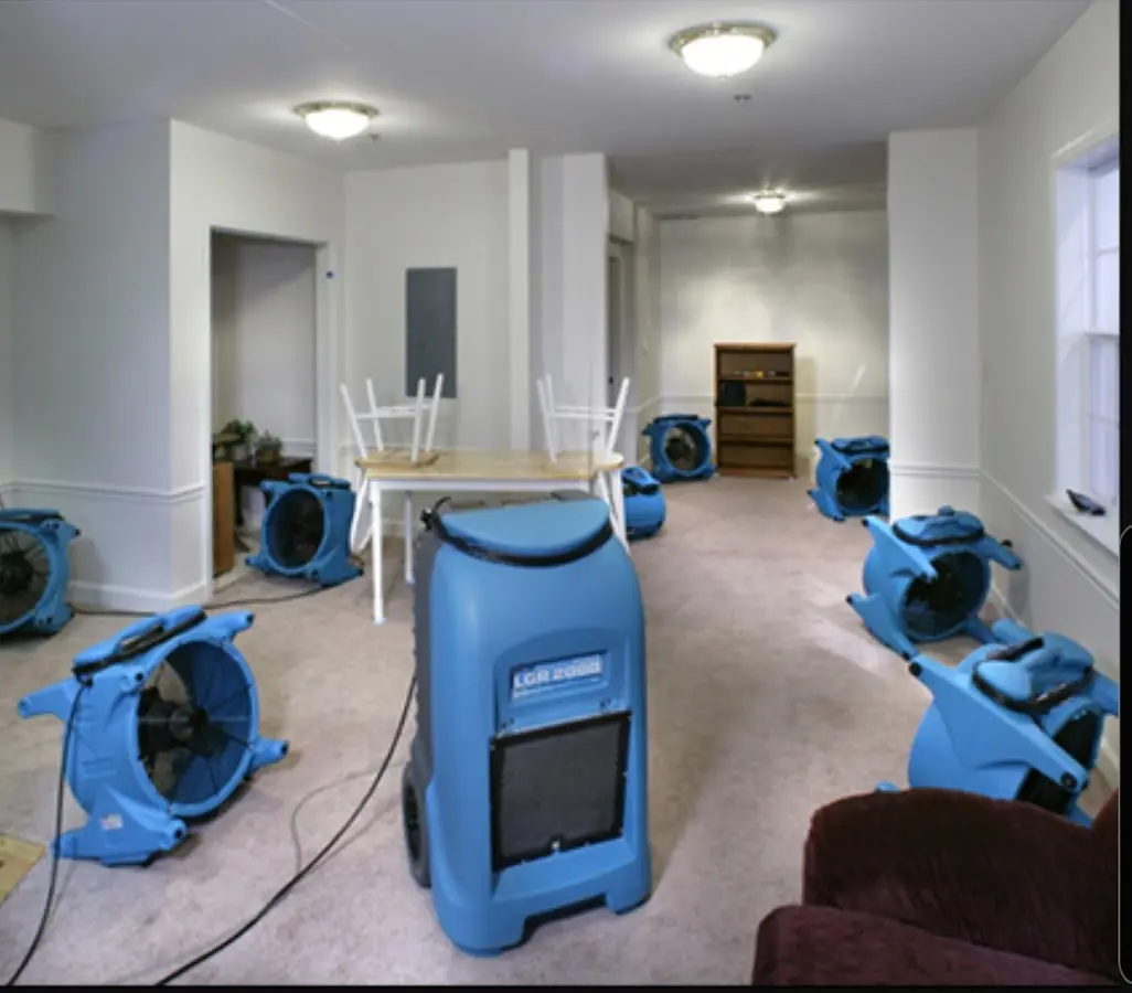 Air movers and dehumidifier setup for Water Damage Restoration in Candler-McAfee